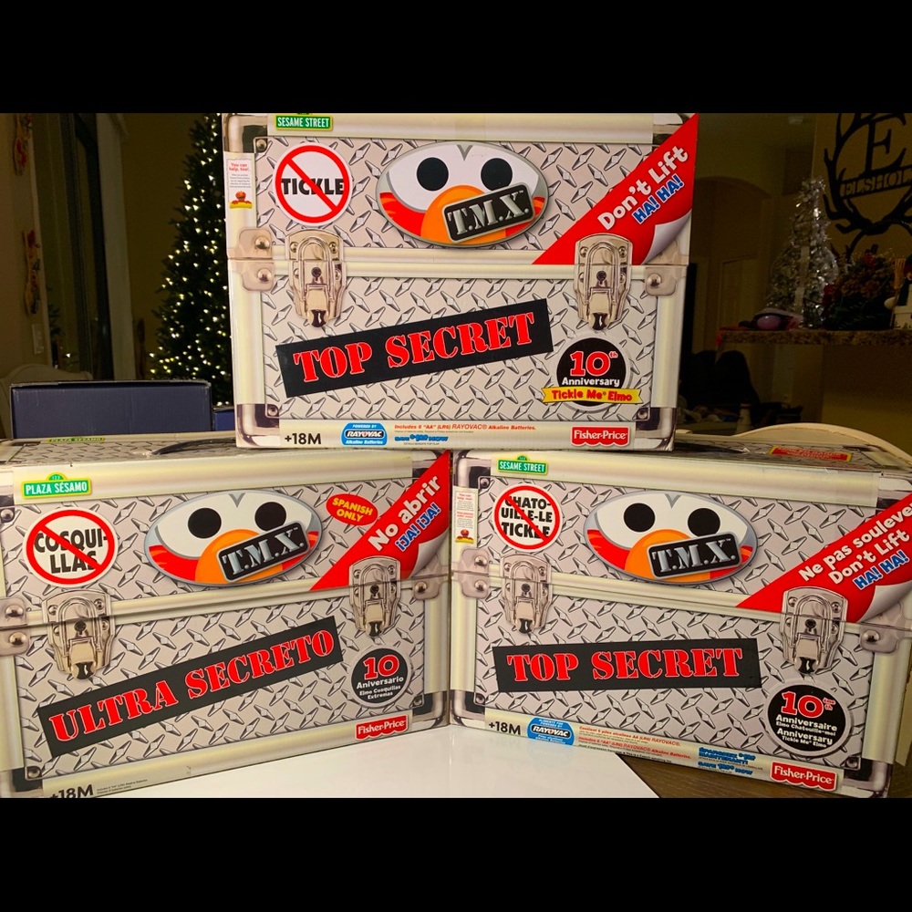 TMX tickle me Elmo ( two spanish, one english)